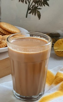Indian cutting chai in a glass 
